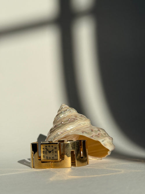 GOLD ANGULAR CUT BANGLE WATCH