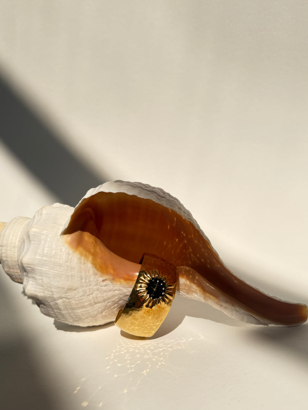 GOLD STARBURST CUFF WATCH