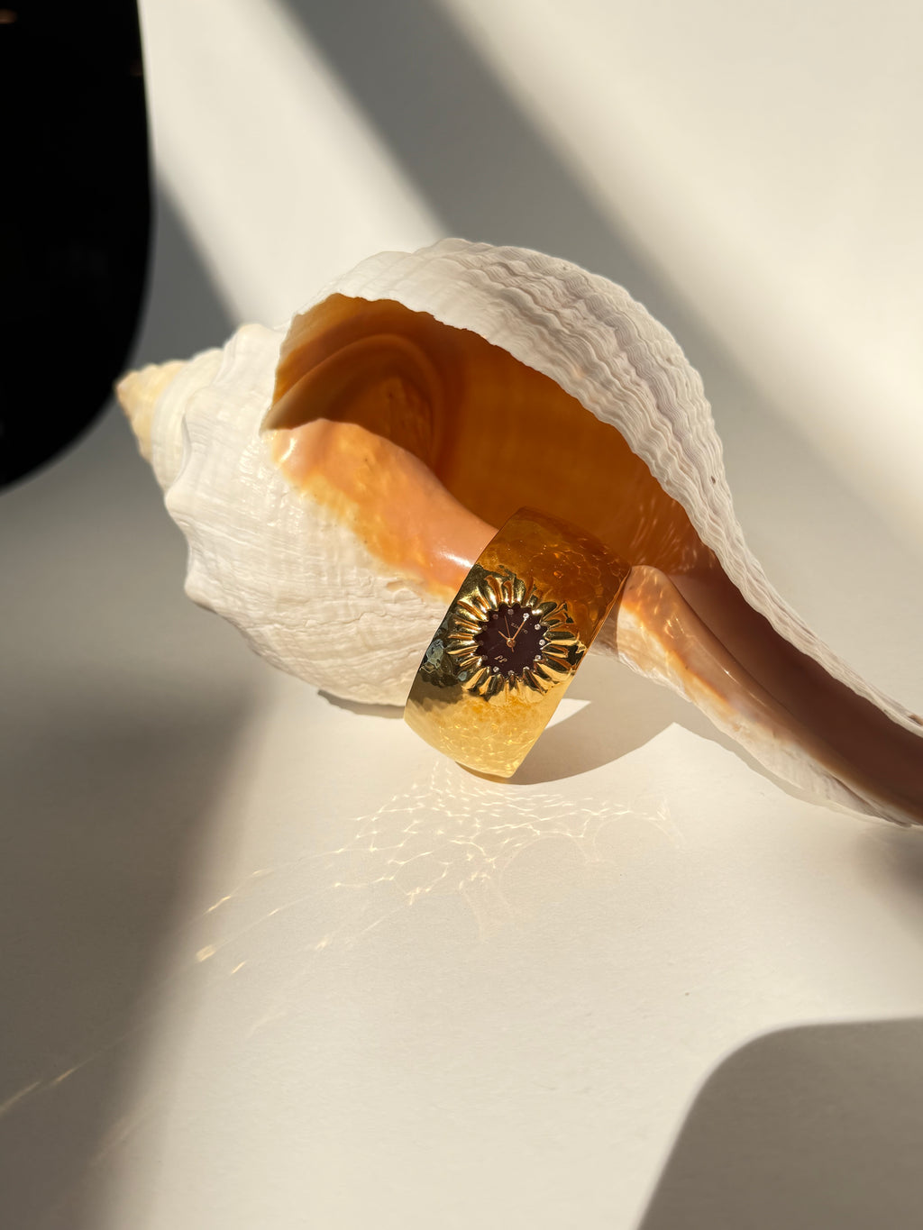 GOLD STARBURST CUFF WATCH