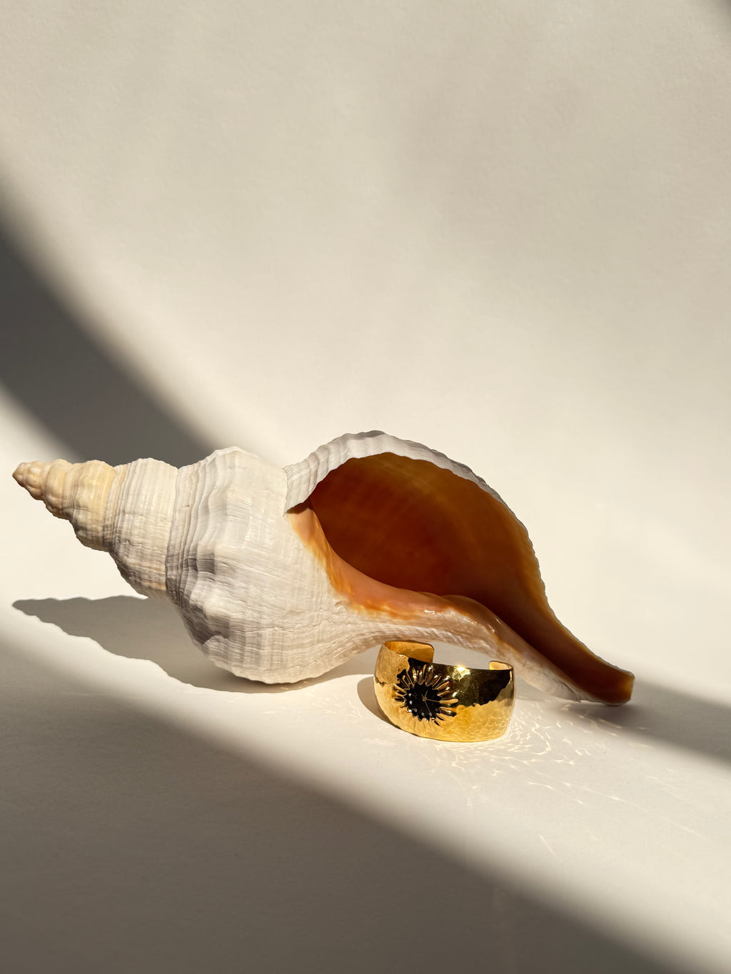 GOLD STARBURST CUFF WATCH