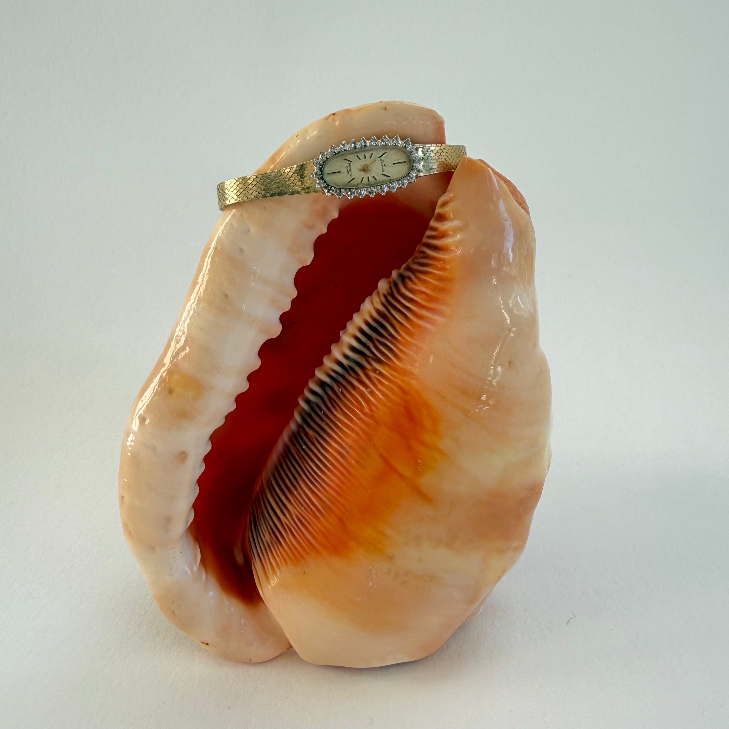 GOLD AND SWAROVSKI CRYSTAL WRIST WATCH