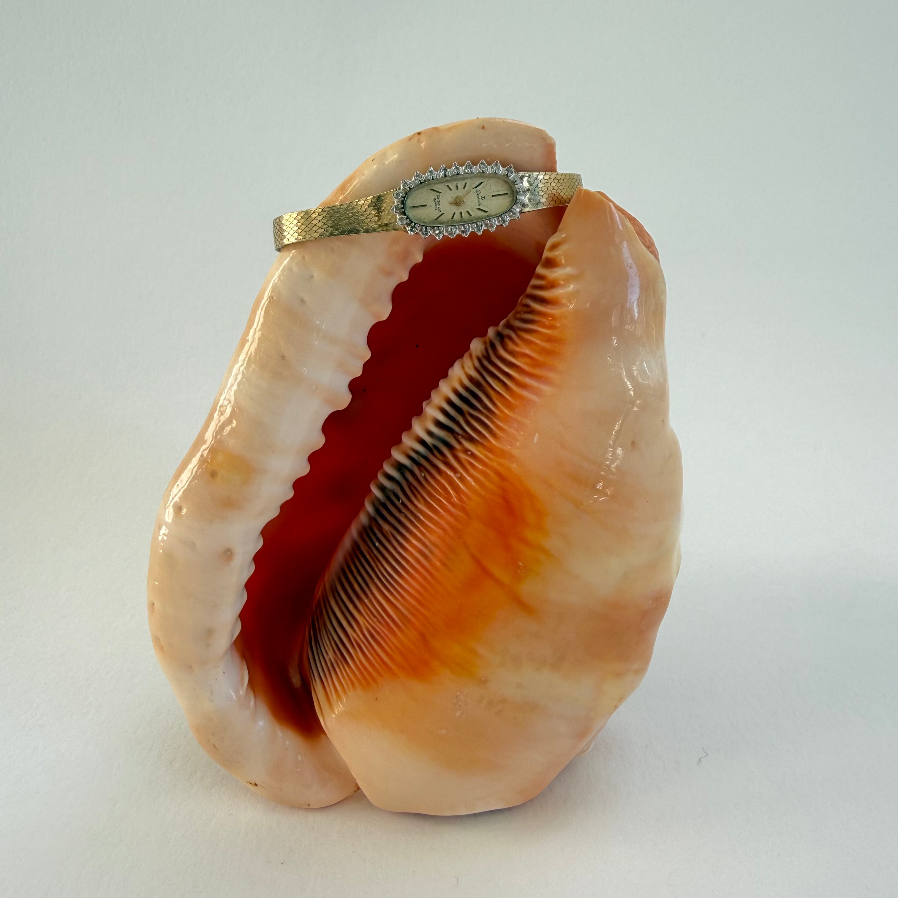 GOLD AND SWAROVSKI CRYSTAL WRIST WATCH