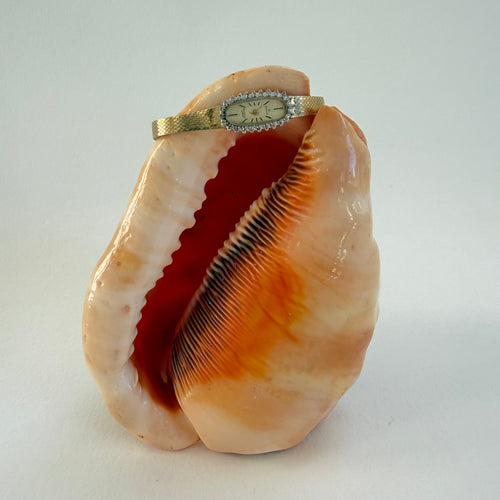 GOLD AND SWAROVSKI CRYSTAL WRIST WATCH