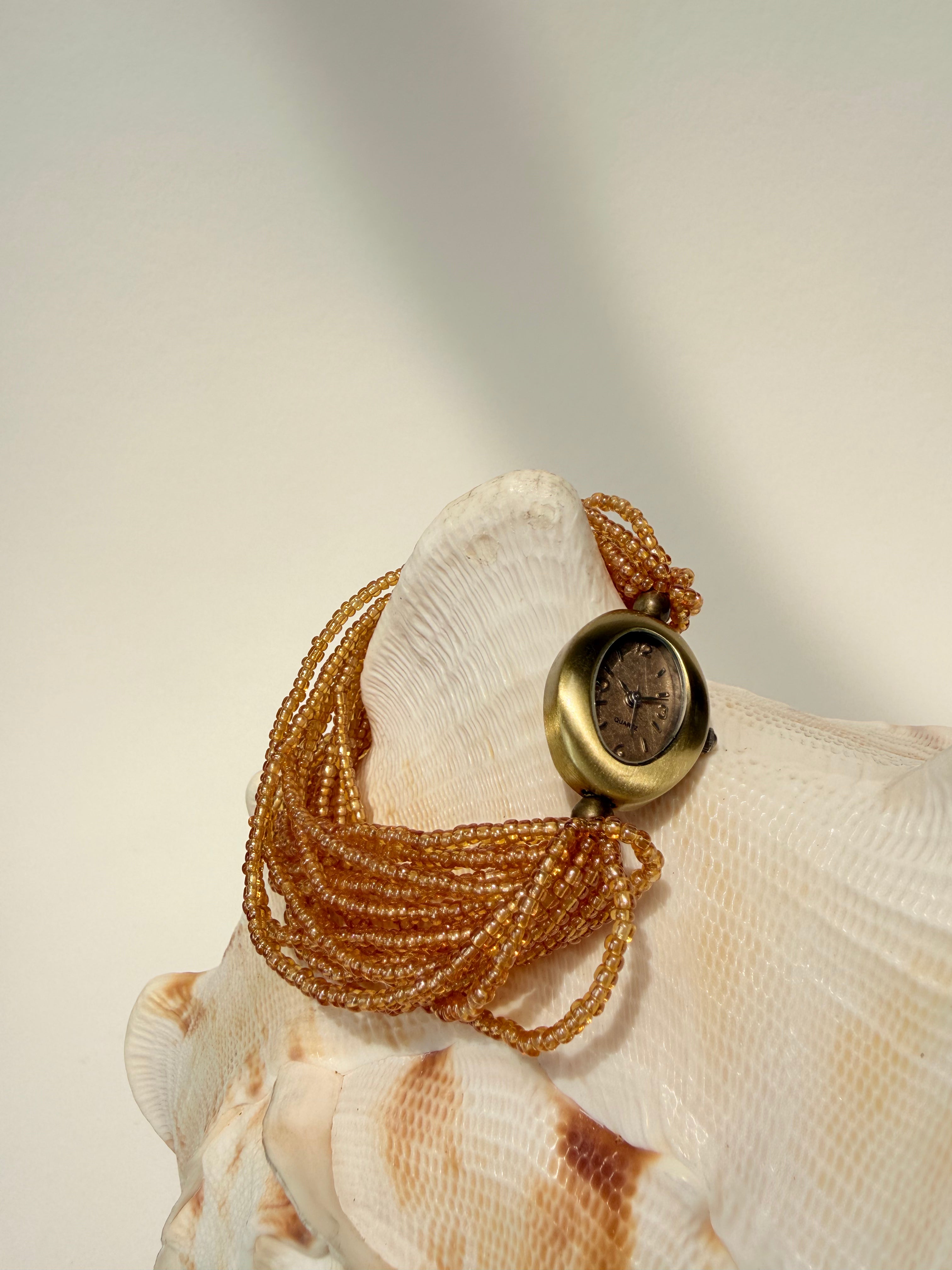 BEADED BAND GOLD TONAL OVAL STRETCH CUFF WATCH