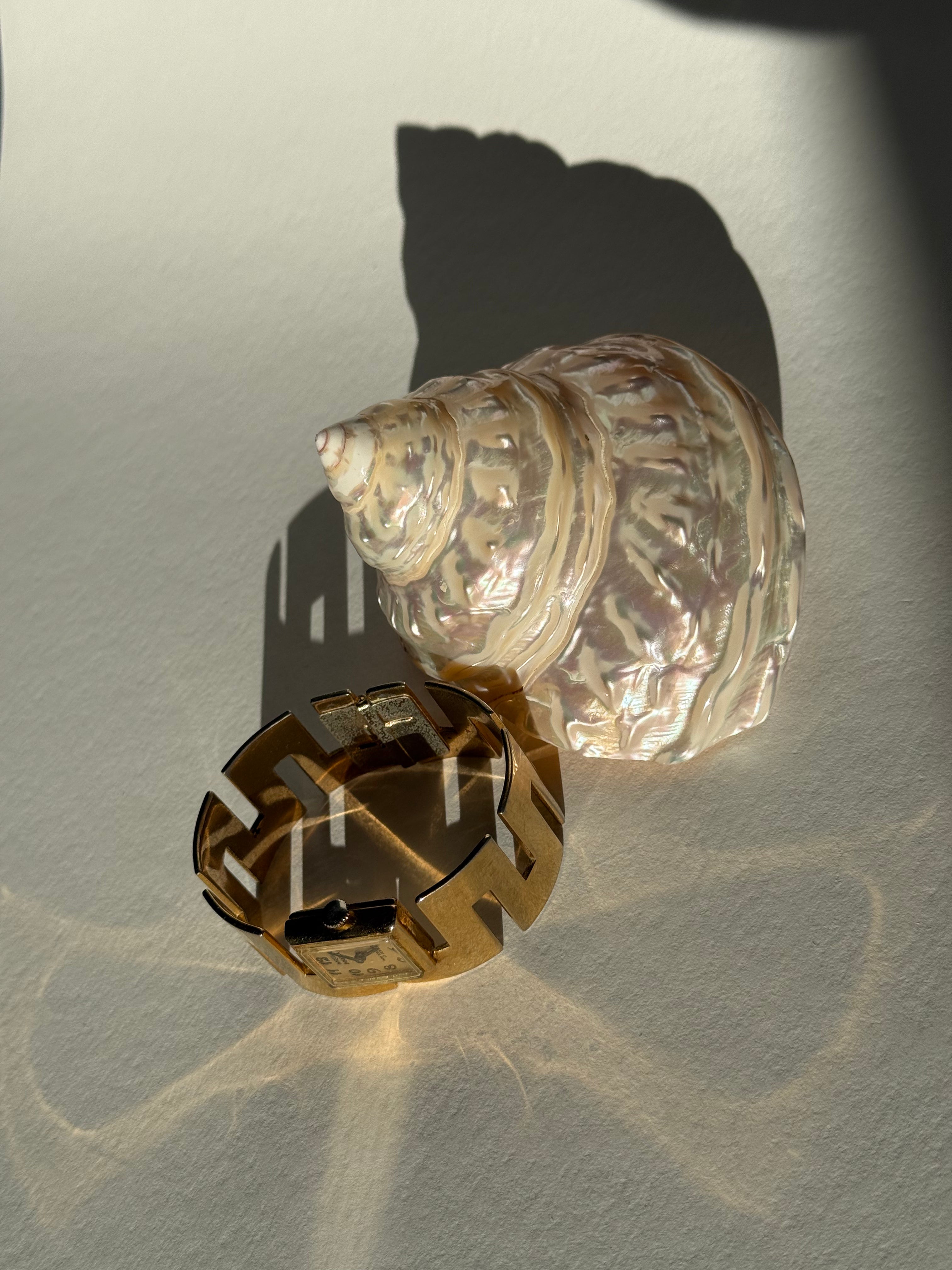 GOLD ANGULAR CUT BANGLE WATCH