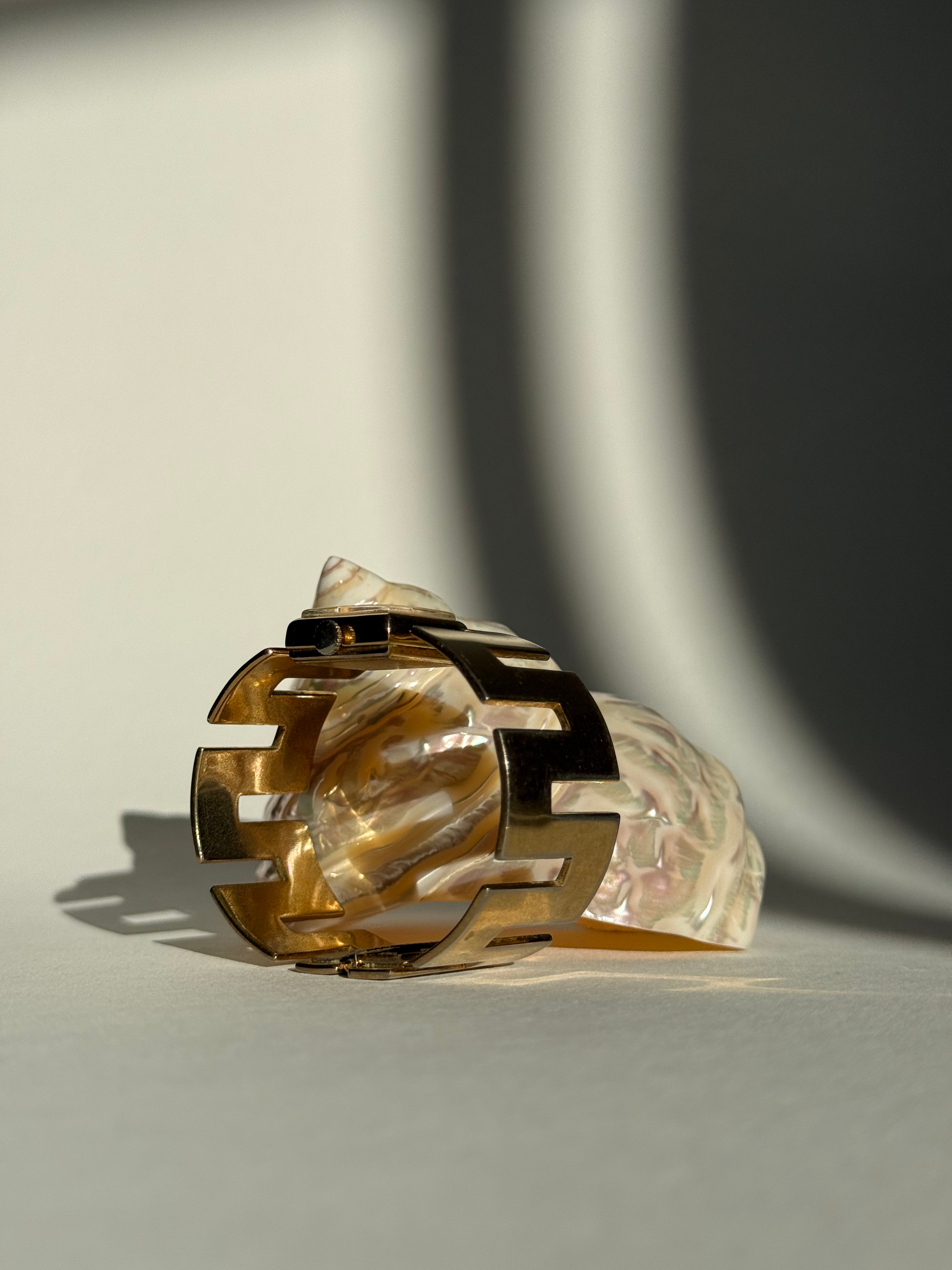 GOLD ANGULAR CUT BANGLE WATCH